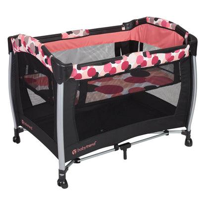 Baby Trend Resort Elite Nursery Center with Bassinet and Travel Bag - Dotty Pink. Female