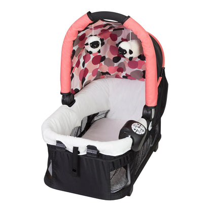 Baby Trend Resort Elite Nursery Center with Bassinet and Travel Bag - Dotty Pink. Female