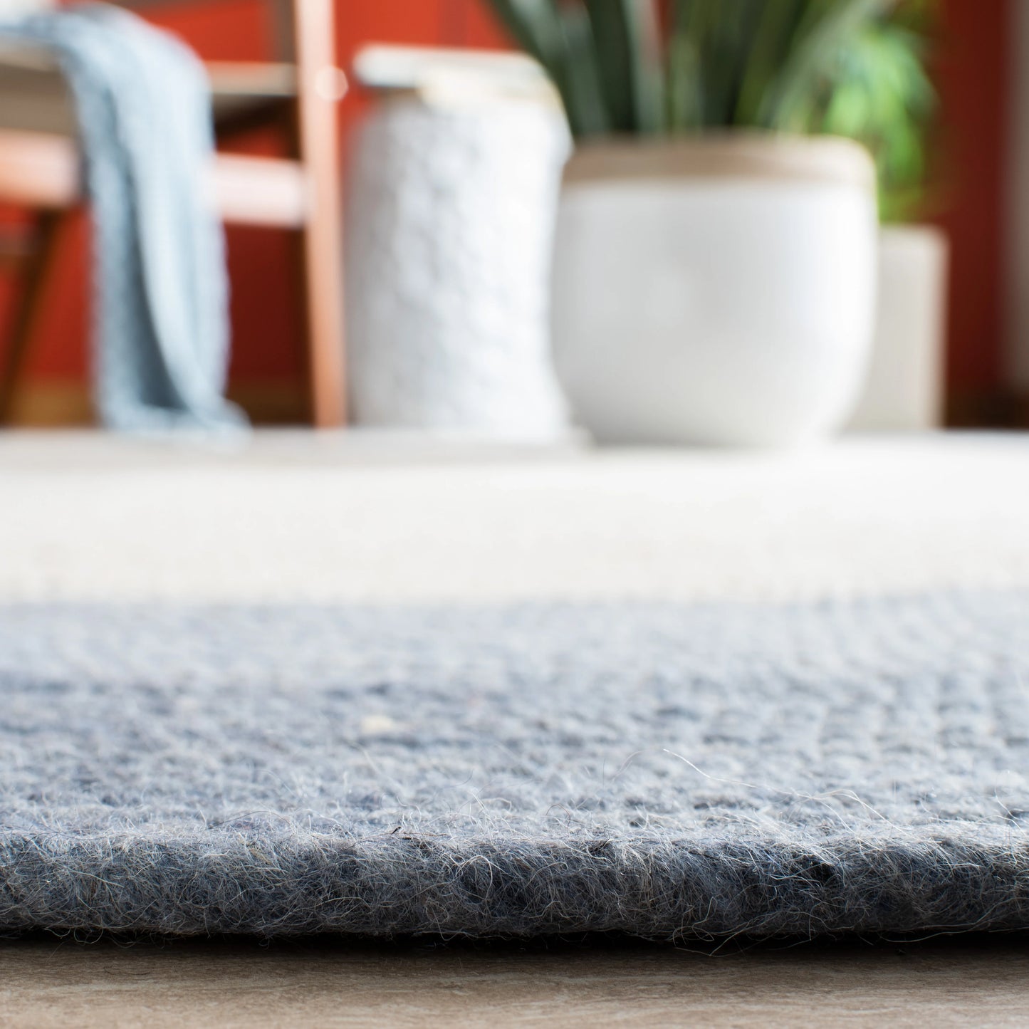 SAFAVIEH Braided Nazca Solid Bordered Area Rug, Ivory/Blue, 4' x 6' Oval