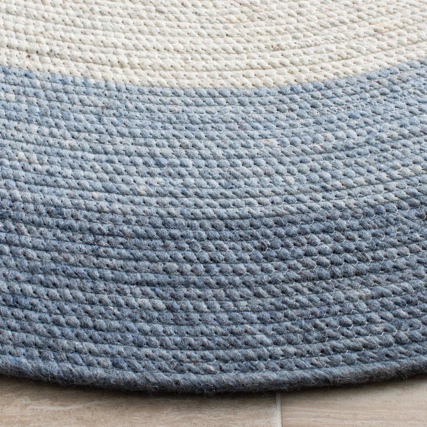 SAFAVIEH Braided Nazca Solid Bordered Area Rug, Ivory/Blue, 4' x 6' Oval