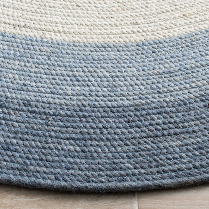 SAFAVIEH Braided Nazca Solid Bordered Area Rug, Ivory/Blue, 4' x 6' Oval