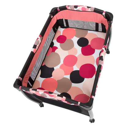 Baby Trend Resort Elite Nursery Center with Bassinet and Travel Bag - Dotty Pink. Female